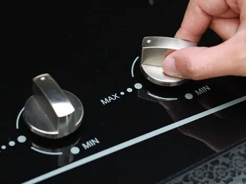 ทำไมไม่ควรหมุนปุ่มเตาแก๊สไปทางปิดเพื่อให้ไฟอ่อนลง?