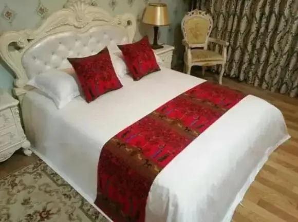 ความลับที่คนรักการท่องเที่ยวต้องรู้เกี่ยวกับผ้าพาดเตียง